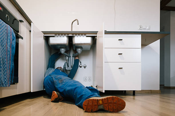Professional Emergency Plumber technician working in Grayson, KY